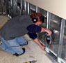 Installing a drywall repair system in a Lowell home.